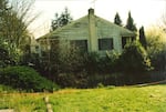 A view of the north side of Harriet Thompson's home, taken from a gravel parking lot near Morningside Elementary School. Salem Statesman Journal newspaper carrier Janelle Tomason was in this parking lot facing this direction on March 20, 1998 when she saw a white man running away from Thompson's residence. 