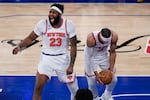 New York Knicks center Mitchell Robinson (23) and guard Josh Hart (3) celebrate after Game 4 of the NBA Finals basketball series against the San Antonio Spurs, Wednesday, June 10, 2026, in New York.
