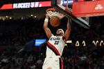 Portland Trail Blazers forward Toumani Camara dunks against the Philadelphia 76ers during the second half of an NBA basketball game, Monday, Feb. 9, 2026, in Portland, Ore.