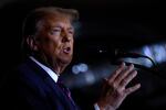 Republican presidential candidate and former U.S. President Donald Trump delivers remarks during his primary night rally at the Sheraton on Tuesday in Nashua, N.H.