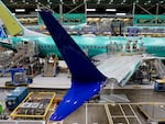 Boeing 737 MAX airplanes sit on the assembly line at the company's facility in Renton, Wash. 