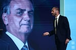 Eduardo Bolsonaro speaks next to an image of his father, former Brazilian President Jair Bolsonaro during the CPAC Argentina 2024, Conservative Political Action Conference