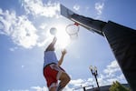 Mark Eberhardt goes for a layup during warmups for one of his team's games in the unified bracket of the Rip City 3-on-3 Basketball Tournament.