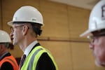 Portland Mayor Ted Wheeler donned a hardhat and safety vest to tour the new facilities at Franklin High. 