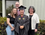 Sara Cady graduated high school in 2022, with help from the LifeWorks NW Adolescent Day Treatment program. Cady is pictured with her family: mother and father Sandra and Josh, and sister Emma.