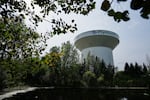 FILE — A water tower is seen Thursday, July 30, 2026, in Plymouth, Minn. A cyberattack targeted the operating technology at over 30 water systems in Minnesota, including Plymouth's, earlier this week, state officials said.