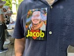 Supporters of Robert Jacob Hoopes demonstrate outside the federal court house on July 28, 2025. Hoopes is accused of throwing a rock that struck an ICE officer and damaging government property.
