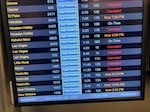 A flight board shows canceled flights at the Southwest Airlines terminal at Los Angeles International Airport, on Monday.