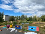 It’s the middle of April and with state dollars for summer funding stalled in the Legislature, families and organizers have little time to pull together robust programming this summer. In this file photo from 2021, Portland-area students painted stock tanks in a summer program.