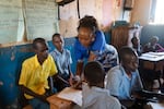 Teacher Florence Lerapayo grades the assignments done by the moran boys. She says they have an enormous amount of catching up to do. But she's also confident that it's not too late for them.