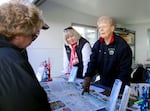Clatsop Cruise Hosts Robbie Mattson (left) and Marion Soderberg (right) welcome cruise ship visitors at the bottom of the docking ramp in the Port of Astoria on April 16, 2026.