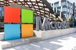 FILE - A Microsoft sign and logo are pictured at the company's headquarters, Friday, April 4, 2025, in Redmond, Wash.