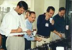 Evaluating coffees at the first Cup of Excellence, then dubbed Best of Brazil, in 1999.