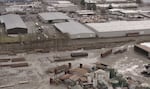 An aerial image provided by Beyond Toxics made with a drone shows the J.H. Baxter wood treatment facility in Eugene, Ore., in January 2022.