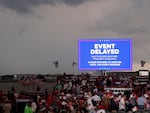 Supporters of former President Donald Trump file out of the rally after it was canceled due to threatening weather in Wilmington, N.C., Saturday, April 20, 2024.