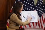 Agriculture Secretary Brooke Rollins points to a chart on SNAP benefits during a news conference on Capitol Hill on Oct. 31, 2025 in Washington, DC.