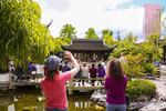 People gather at the Lan Su Chinese Garden in Portland's Old Town to celebrate Asian-Pacific American Heritage Month.