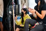 Alberta Poon, center, directs a scene of her film "Crouching Comic."