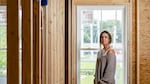 Becca Morris stands in the home she's in the process of buying in Harrington, Del. She saved up for it during nine years in subsidized housing in a nearby town.
