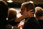 Anthony Broadman is celebrated after his senate victory becomes apparent at the Deschutes Democrats election watch party in Bend, Ore., on Nov. 5, 2024.