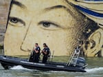 Security patrol by boat in Paris, France, before the opening ceremony of the 2024 Summer Olympics, Friday, July 26.