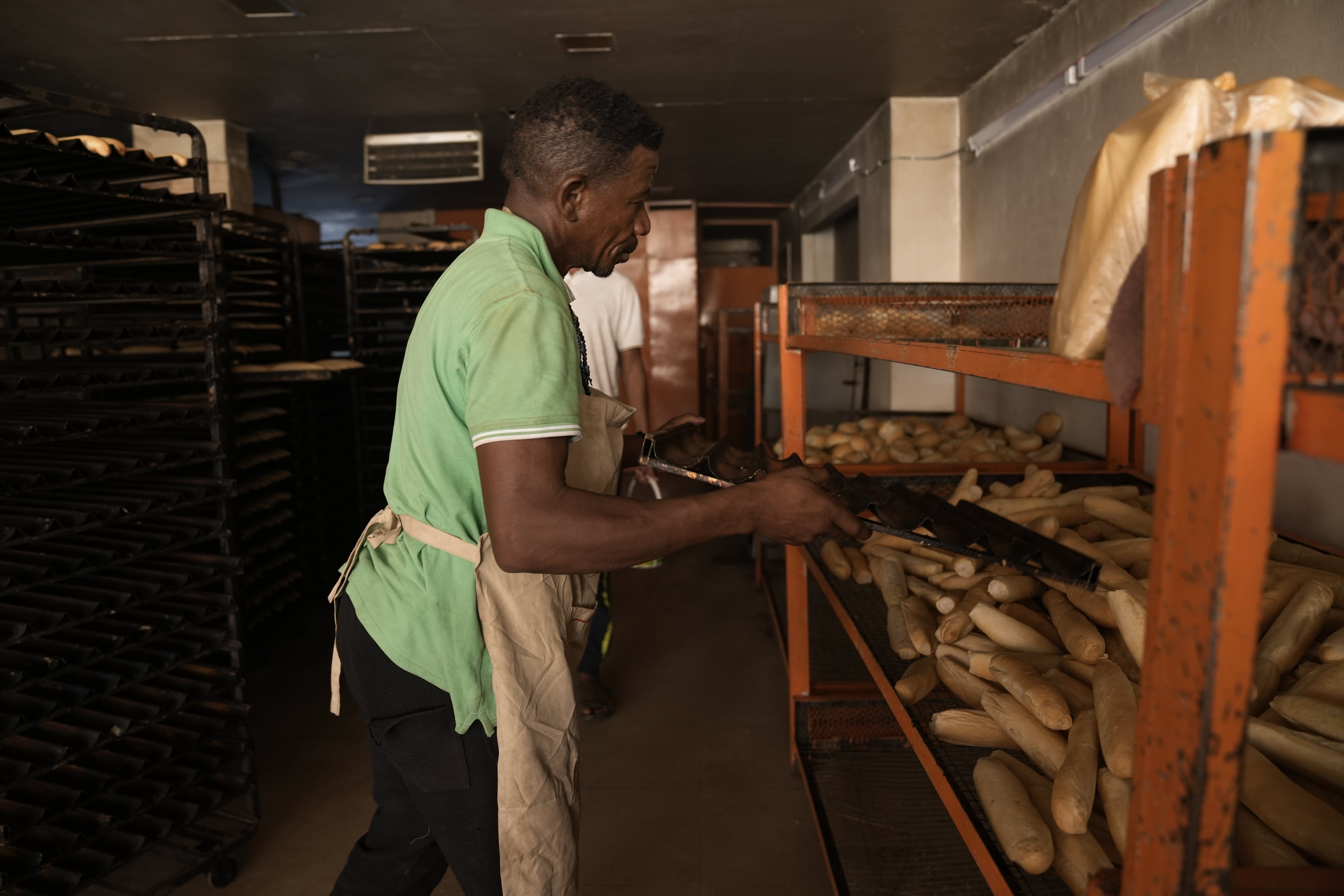 A worker at a bakery in Khartoum. The owner has returned after fleeing due to the fighting.