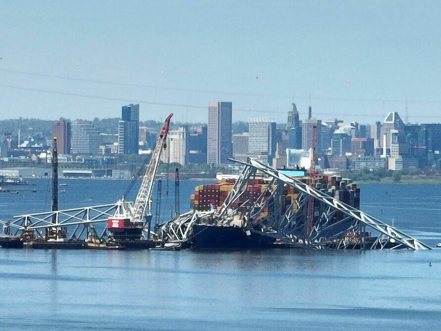 Salvage crews in Baltimore continue to remove wreckage from the Dali on April 26, one month after the cargo ship smashed into the Francis Scott Key Bridge and caused it to collapse.