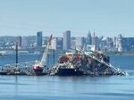 Salvage crews in Baltimore continue to remove wreckage from the Dali on April 26, one month after the cargo ship smashed into the Francis Scott Key Bridge and caused it to collapse.