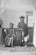 "Portrait of Two Women in Partial Native Dress with Headdress and Ornaments, Both Holding Arrows? 1900"