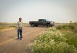 Ryon Freeman looks over the dry lake beds in the Lower Klamath National Wildlife Refuge on Aug. 5.