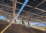 Solar panel installation company Imagine Energy frequently partners up with nonprofit Leaders Become Legends to provide job training for at-risk individuals to help them enter the renewable energy workforce. Here crews are installing solar panels at the 82nd Avenue Community Solar Project on 09/17/26.