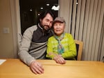 Ki Soon “Harmony” Hyun, right, with her grandson Porter Lane, at her daughter’s home. 