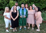 Class of 2025 student Logan and his family at his graduation from McKay High School on June 7, 2024. From left to right, Theresa Hoffman, Crista Stewart, Walter Bryce, Logan, Amirah Holt, Angelina Bryce, Scott Ronck, Debra Ronck, Jenn Luppino