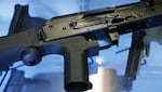 FILE - A bump stock, shown in this Oct. 4, 2017 file photo, will be illegal once the new law goes into effect. The law bans such rapid-fire devices that can effectively turn semi-automatic weapons fully automatic.