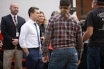 Transportation Secretary Pete Buttigieg talks with instructors at Vancouver's Cascadia Technical Academy during a Feb. 12, 2024, visit. Buttigieg said during the visit he believes a replacement for Interstate 5 Bridge will be built soon.