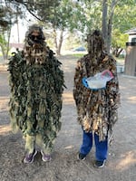 Staff at Bend's Think Wild animal hospital and conservation center wear camouflage "ghillie" suits to reduce the stress human interaction can have on wild animals on July 29, 2022.