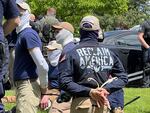 Authorities arrest members of the white supremacist group Patriot Front near an Idaho pride event Saturday, June 11, 2022, after they were found packed into the back of a U-Haul truck with riot gear.