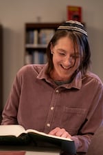 Angel Yael Murauskas laughs while making a point about a passage in Deuteronomy.