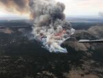 An aerial image shows the Crane Fire burning in the Fremont-Winema National Forest in southeast Oregon, Aug. 16, 2020.