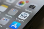 The ChatGPT app icon is seen on a smartphone screen, among other app icons.