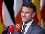 French President Emmanuel Macron speaks to the press at the end of the European Council Summit at the EU headquarters in Brussels on June 28.