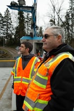 Mike Bezner (left) and Randy Harmon ride the Canby Ferry. 