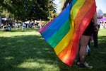 Friends gather at Bend Pride in Drake Park on June 7, 2025, in Bend, Ore. The theme for this year's event was "Never Going Back!"