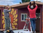 Volunteers helping build tiny-homes for Parkrose Community Village, the first micro-village created by the new nonprofit WeShine.