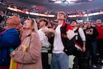 FILE - Fans gaze at the new jumbotron at the Moda Center on the Trail Blazers' opening night in Portland, Ore., Oct. 22, 2025.