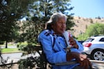Delson Suppah Sr. enjoys the shade and the company near the village pool at Kah-Nee-Ta. 