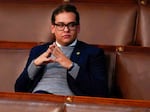 U.S. Rep. George Santos (R-N.Y.) waits for the start of a session in the House chamber on Jan. 6.
