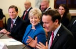 Connecticut Sen. Chris Murphy (right) introduces Linda McMahon at her 2017 Senate confirmation hearing for her nomination to the SBA. Sen. Richard Blumenthal, also of Connecticut, smiles on the left.