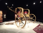 Exhibit objects, like this chariot, are replicas.