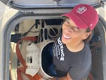 Oceanographer and former Oregon State University professor Dawn Wright poses for a photo while entering a deep sea submersible on July 11, 2022. The next day, she and Victor Vescovo used the submersible to descend to Challenger Deep, the deepest known spot on the planet.